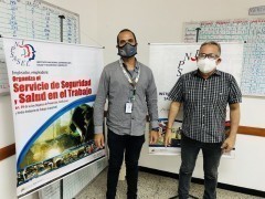 Geovanni Peña, the director of the National Institute of Prevention, Health and Worker Safety, and on the left Angel Suarez, a member of the national federation of healthcare workers. Geovanni Peña and Angel Suarez