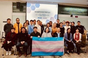 908 | MR Onlinenbsp | Pan third from the right poses for a group photo during a forum on healthcare for transgender people in China November 2021 Courtesy of Beijing Youth Daily | MR Online